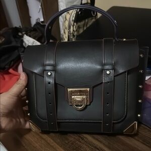 Michael Kors Black and Gold Satchel with Structured Design